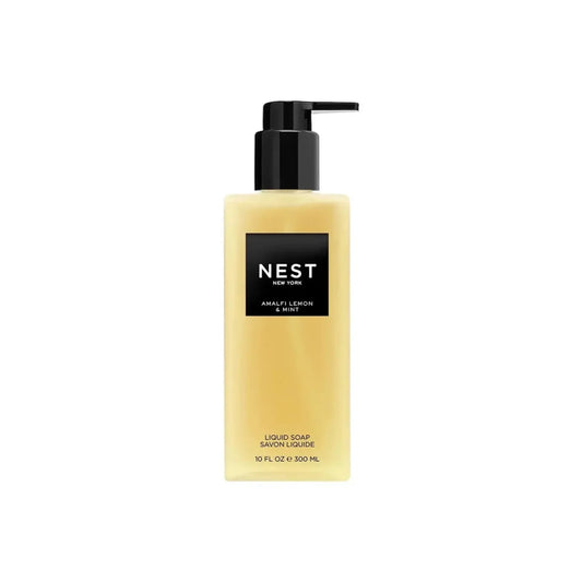 A bottle of NEST Amalgi Lemon & Mint liquid soap with a black pump dispenser