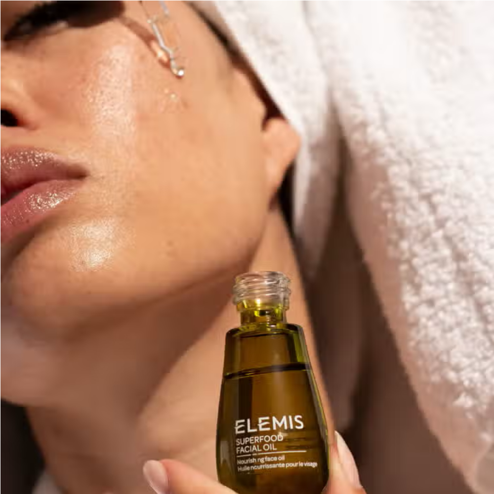 Bottle of Elemis Superfood Facial Oil 15ml for glowing skin.
