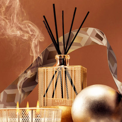 NEST New York Amber & Incense Reed Diffuser 175 mL with warm, luxurious scent to enhance home ambiance with a calming, cozy fragrance.









