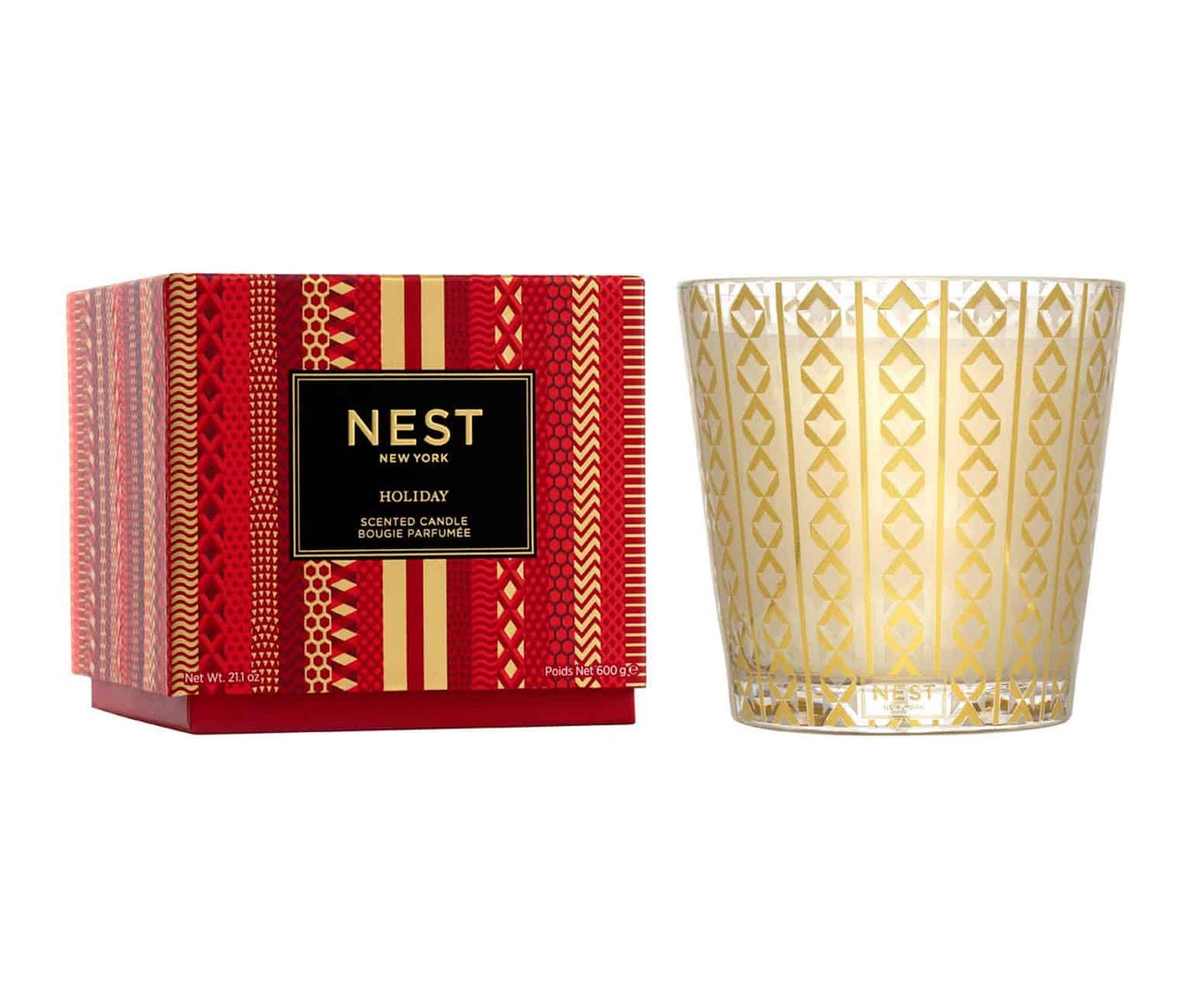 Nest New York Holiday Candle with seasonal scent in a glass jar








