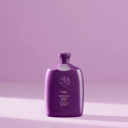 Bottle of Oribe Serene Scalp Densifying Shampoo for scalp care and hair volume.
