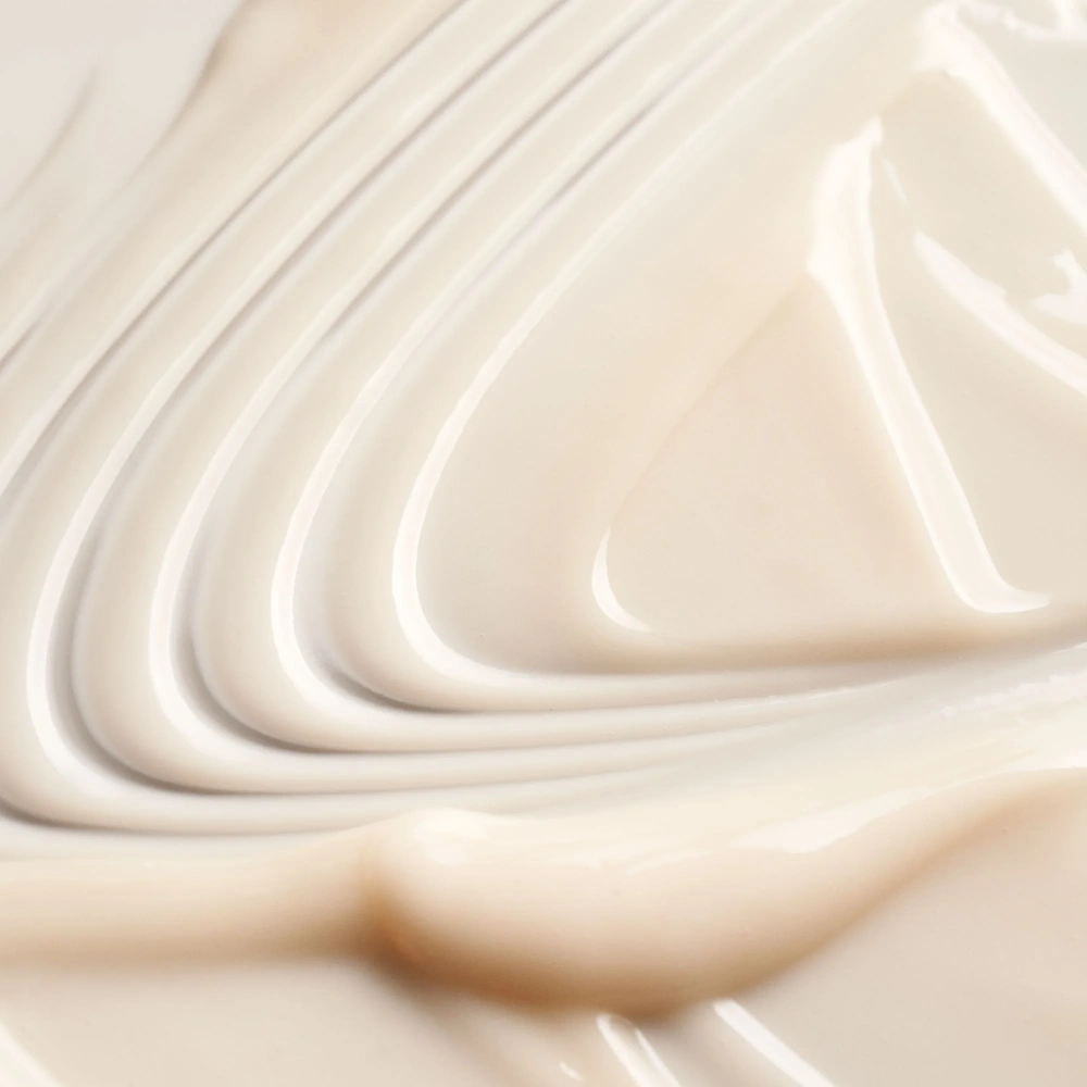 Oribe Serene Scalp Densifying Conditioner for healthy scalp and voluminous hair.